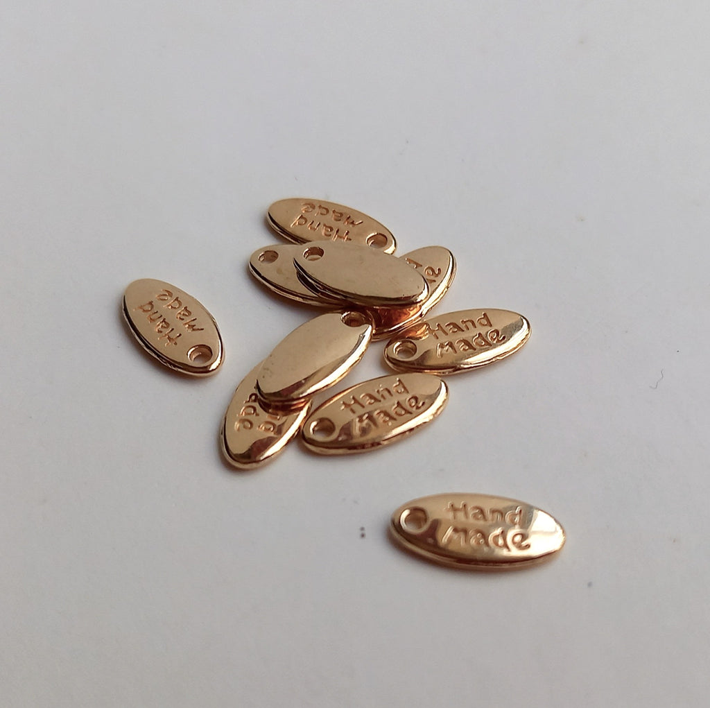 Gold Handmade Charms – Oval shape with writing