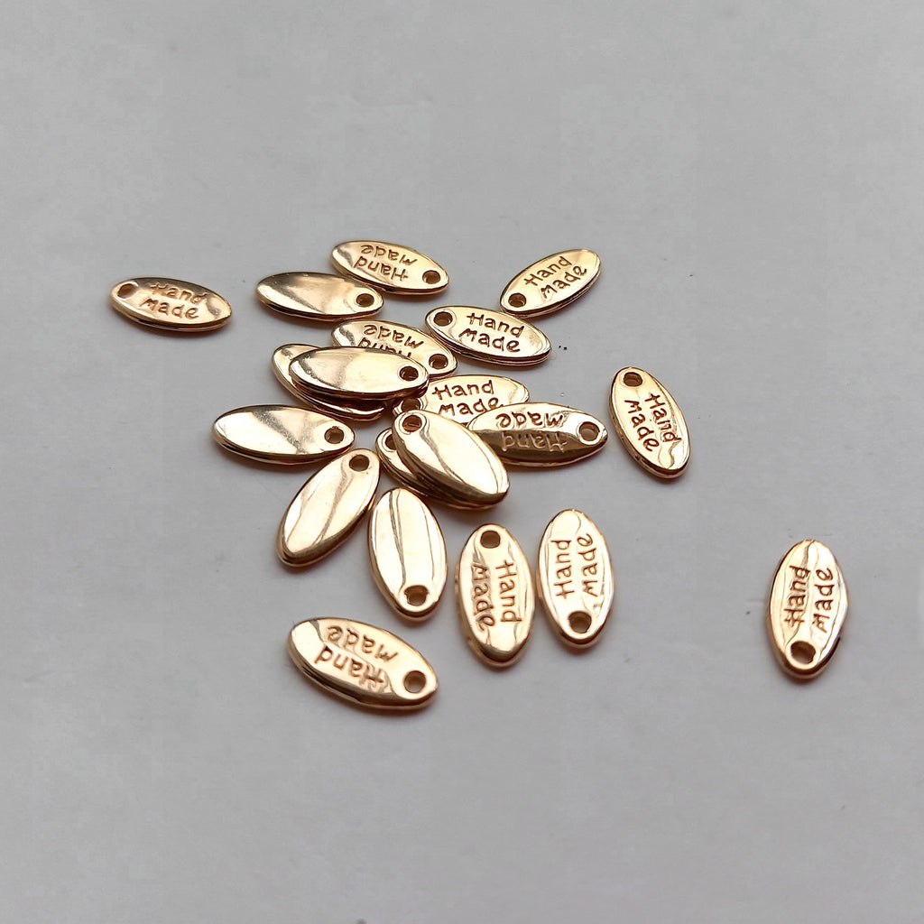 Gold Handmade Charms – Oval shape with writing