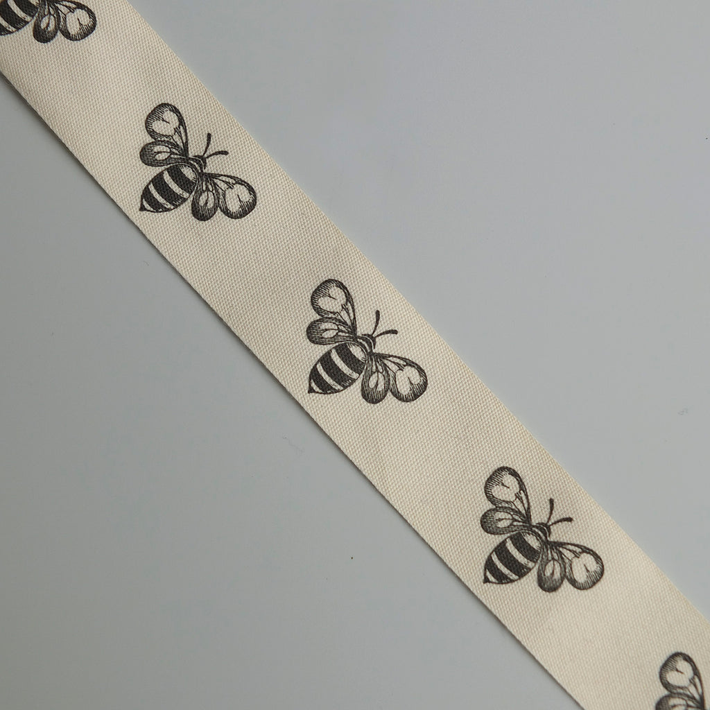 2 metres of Cream Cotton Ribbon with Bee Print - 25mm wide